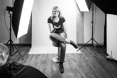 FRAU SCHMITT FOTOGRAFIERT.